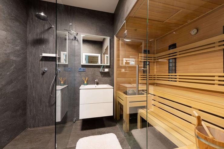 Kúpeľňa s presklenou saunou